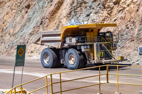 Big haul truck and machinery working in Chuquicamata, biggest open pit copper mine of the world, Calama, Chile