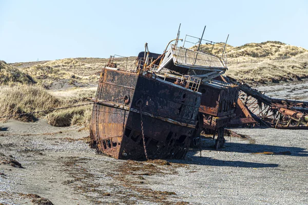 stock image Wreckages, abandoned rusty stranded boat on San Gregorio beach in the south of Chile at the strait of Magellan