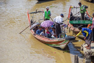 People take the boat to cross the Yangon River (also known as Rangoon River or Hlaing River)