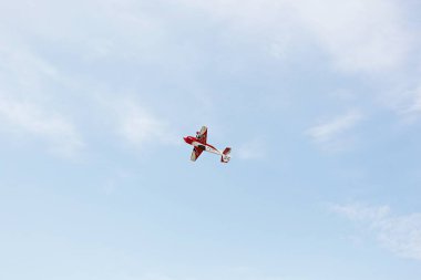 a model airplane flying in the sky