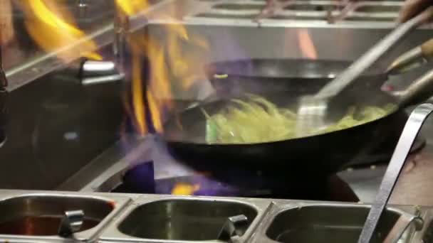 Frying potatoes in a fast food restaurant. Closeup — Stock Video