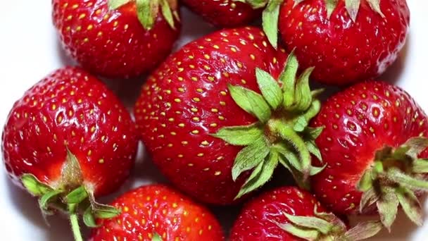 Rotating strawberry. Fresh, ripe, juicy, delicious strawberries.  Macro. — Stock Video
