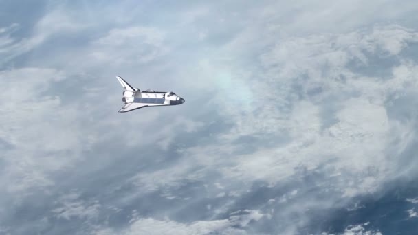 Space Shuttle boven de aarde. — Stockvideo