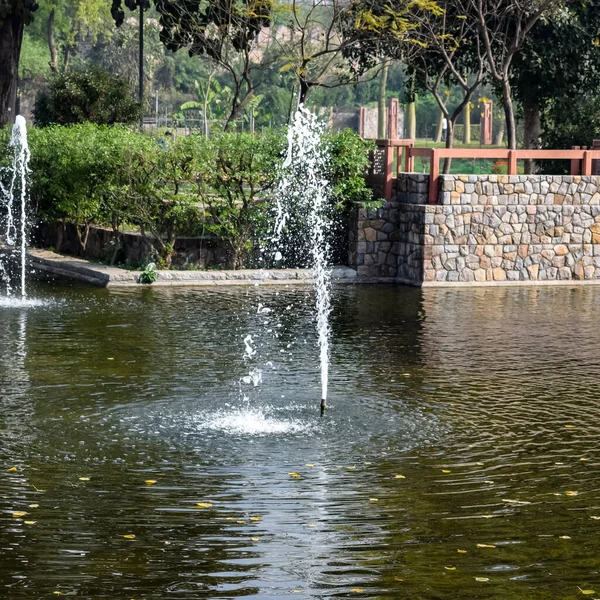 Fountain in the garden of Sunder Nursery in Delhi India, working fountain in the Sunder Nursery complex, water in the fountain, fountain in the park during morning time