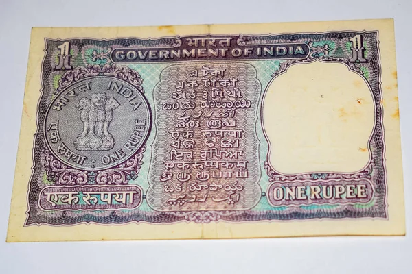 Rare Old Indian One rupee currency note on white background, Government of India one rupee old banknote Indian currency, Old Indian Currency note on the table