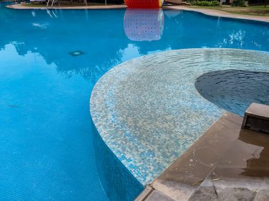 Big size swimming pool view during evening time for leisure time, Swimming Pool view during day time for relaxing