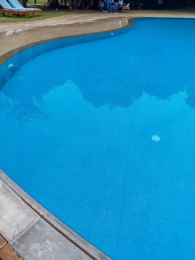 Big size swimming pool view during evening time for leisure time, Swimming Pool view during day time for relaxing