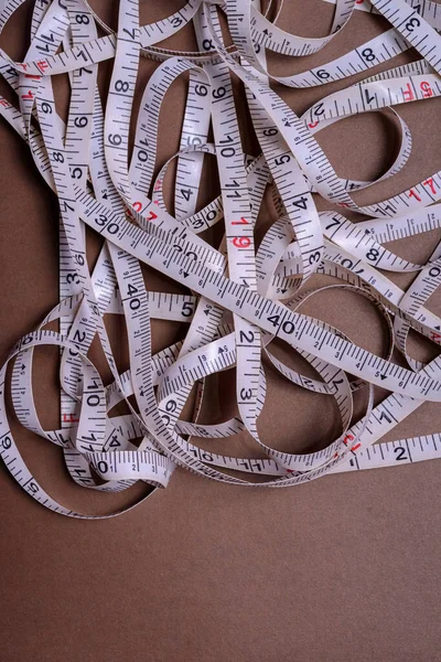 Tape Measure Rolled Out Randomly — Stock Photo, Image