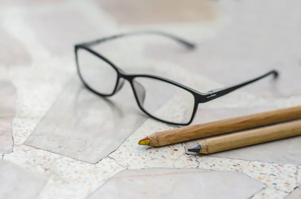 Pencil on marble desk — Stock Photo, Image