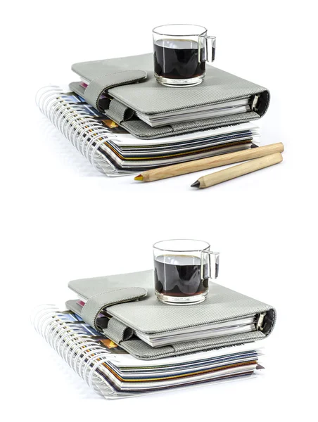 Black coffee on notebook — Stock Photo, Image