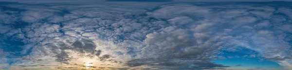 Sky panorama with Stratocumulus clouds in Seamless spherical equirectangular format. Full zenith for use in 3D graphics, game and editing aerial drone 360 degree panoramas for sky replacement.