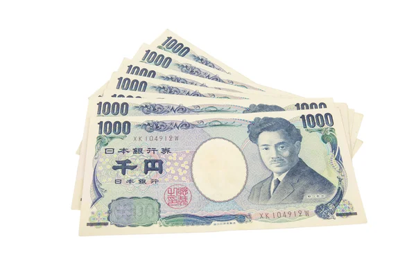 日本円札。白い背景の上の日本の通貨 — ストック写真