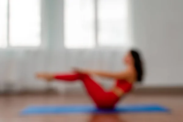 Blur Young Woman Red Tracksuit Doing Exercises Yoga Gym Serious — Stock Photo, Image