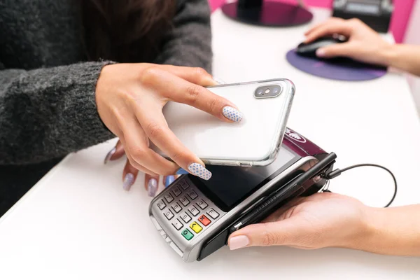 paying a bill with a mobile phone reader