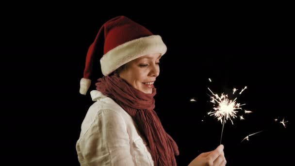 Pretty girl in red Christmas Santa with Sparklers — Stock Video