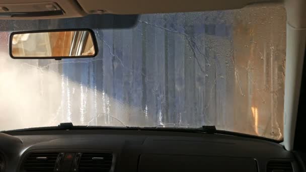 Automatic tunnel car wash. View from inside. — Stock Video