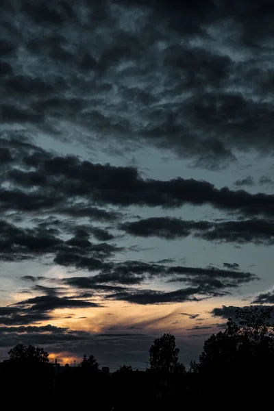 Colorful sunset sky and clouds, image twilight background. Abstract nature backgrounds. Dramatic blue and orange, colorful clouds at twilight time. Copy space for site