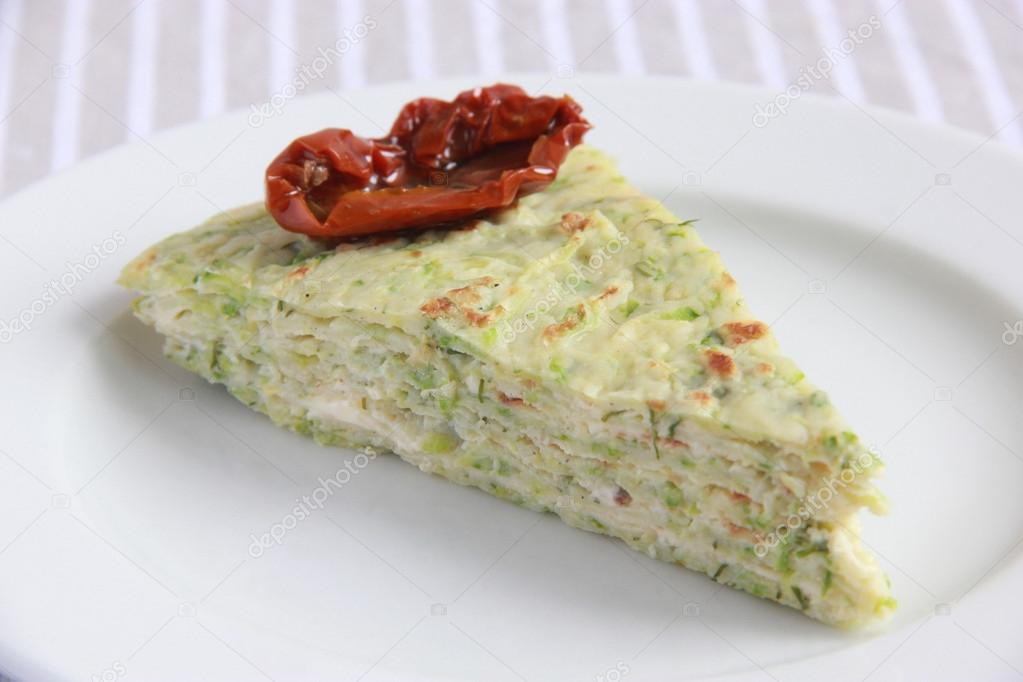 Zucchini cake with mayonaisse and tomatoes