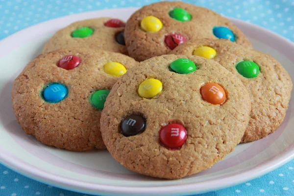 Peanut butter cookies with sweets — Stock Photo, Image