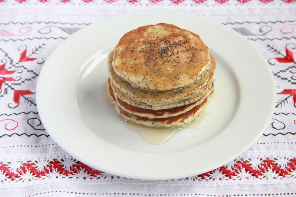 Pancakes with poppy seeds and lemon zest — Stock Photo, Image