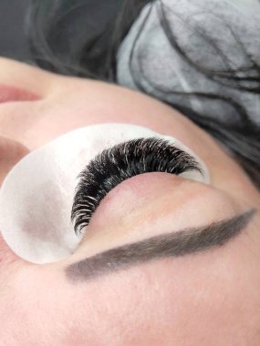 Güzellik salonu makro göz üst görünümü kırbaç uzantıları 