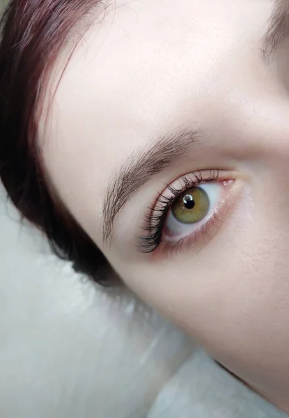 Wimperextensies in schoonheidssalon macro oog — Stockfoto