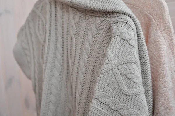 Close up of cozy warm sweaters copy space
