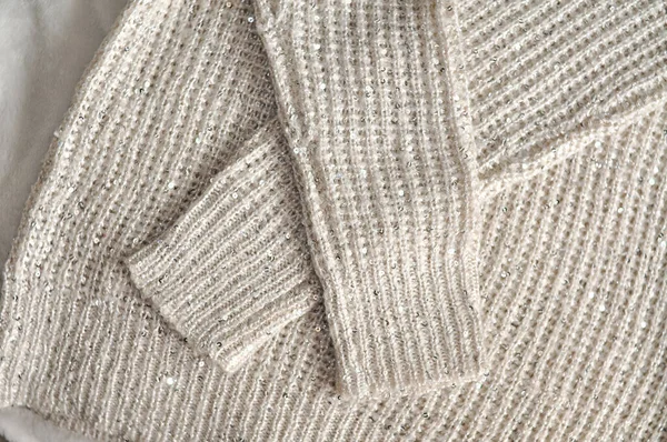 Close up of cozy warm sweaters copy space