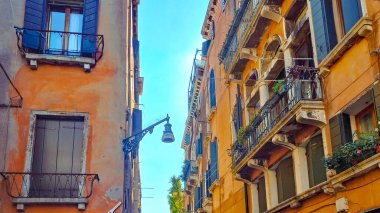 Old Venetian houses built of rustic bricks with warm earthy tones