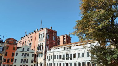 Old Venetian houses built of rustic bricks with warm earthy tones