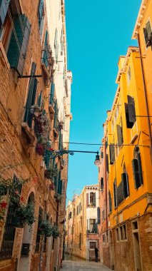 Ancient Venetian residential buildings with rustic faded walls.
