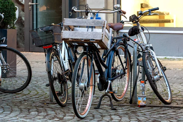 wooden box trunk for bicycle to buy bicycles parked on the street