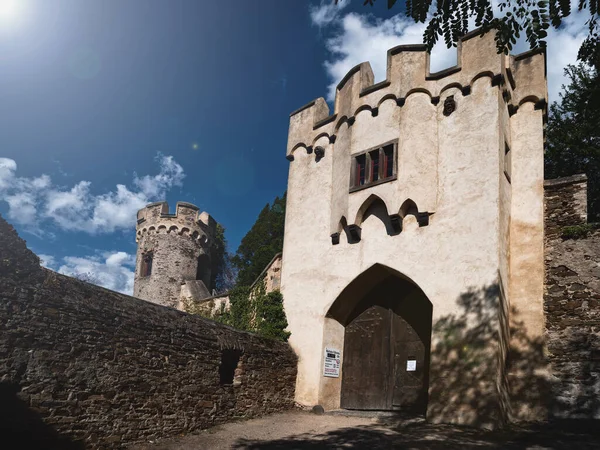 sunlit entrance to a medieval castle