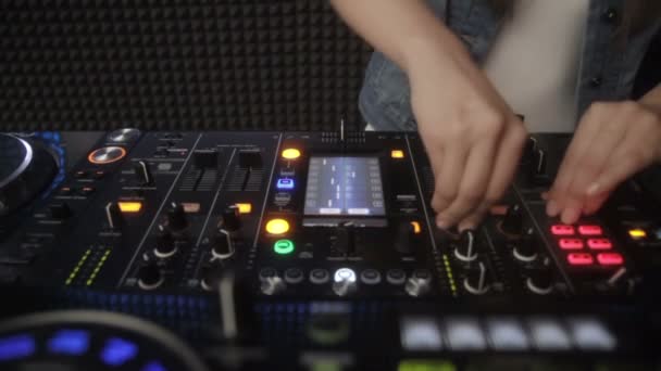 Dj hands on equipment — Stock Video