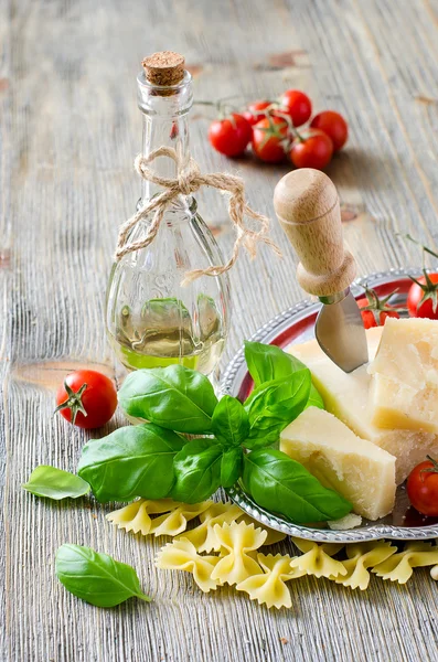 Composition with italian dish ingredients, pasta, parmesan chees — Stock Fotó