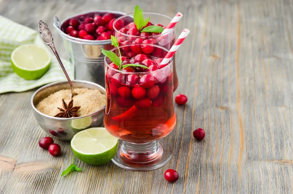 Cranberry cocktail with berries and spices copy space background — Zdjęcie stockowe