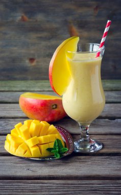 Tropical mango smoothie for healthy breakfast clipart