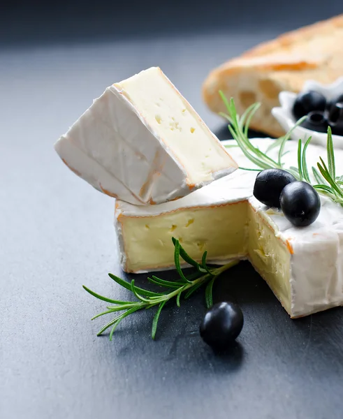 French soft cheese brie with olives and rosemary — Stock Photo, Image