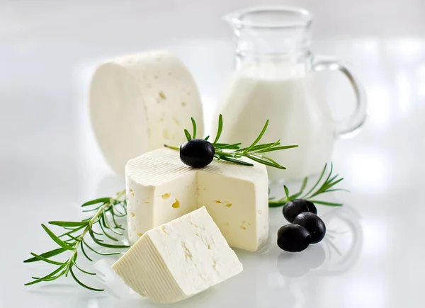 Healthy soft paneer cheese with rosemary and black olives — Stock Photo, Image