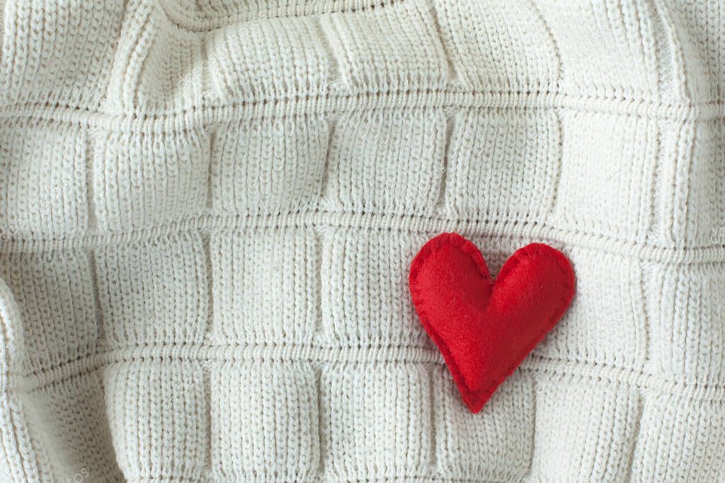 Handmade heart closeup made of felt. Love concept.