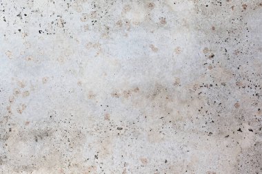 Soyut noktaları olan açık mavi bir duvar. Güzel gri, beyaz doku, soyut duvar yüzey arkaplanı, kopya alanı ile klasik yüzey dokusu, alışılmadık noktalı yüzey.