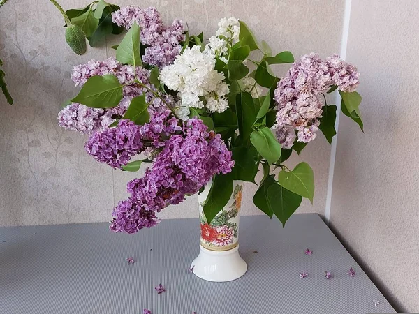 Still life, a bouquet of lilacs in a vase