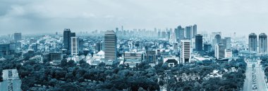 Jakarta gökdelenler batımında Panoraması