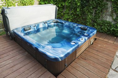 outdoor hot tub, jacuzzi on the garden clipart