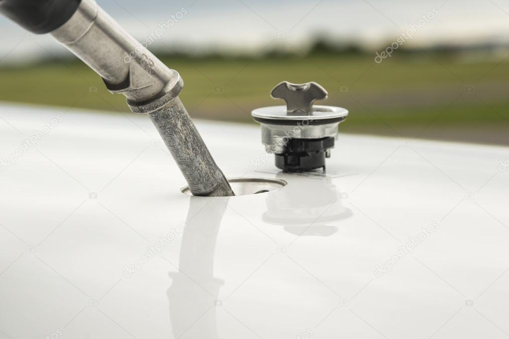 Fuel nozzle filling up aircraft