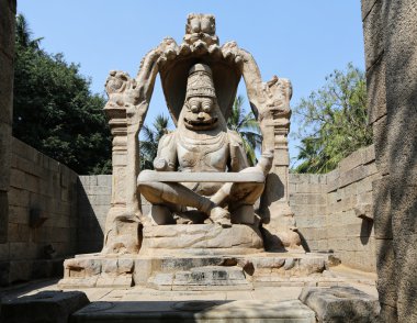 Narasinha (avatar of vishnu) statue in Hampi clipart