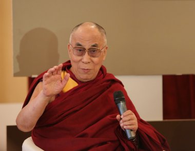 PRAGUE, CZECH REPUBLIC - SEPT 17, 2013: His Holiness the 14th Dalai Lama on press conference in Prefur FORUM 2000, SEPTEMBER 17, 2013 PRAGUE clipart