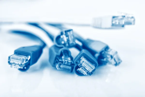 Colorful network cable with RJ45 connectors, blue network cable — Stock Photo, Image