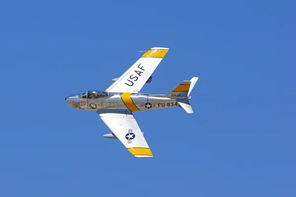 Jet airplane fighter F-86 Sabre flying at air show — Stock Photo, Image