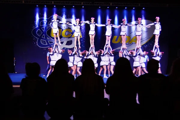 Cheer Leaders Competition with Fans Silhouette